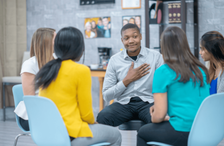 Group of people practicing mindfulness for mental well-being, focusing on emotional resilience and balanced mental health.